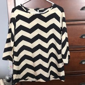 Black and white striped blouse.